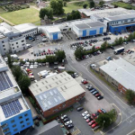 Ariel view of solar panels on college roof